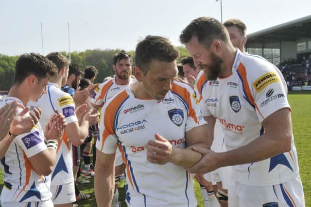 Kevin Sinfield is thanked by his fellow players after his last game for Yorkshire Carnegie.