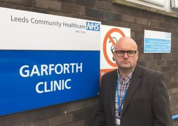 Coun Mark Dobson outside the now-closed Garforth Clinic.