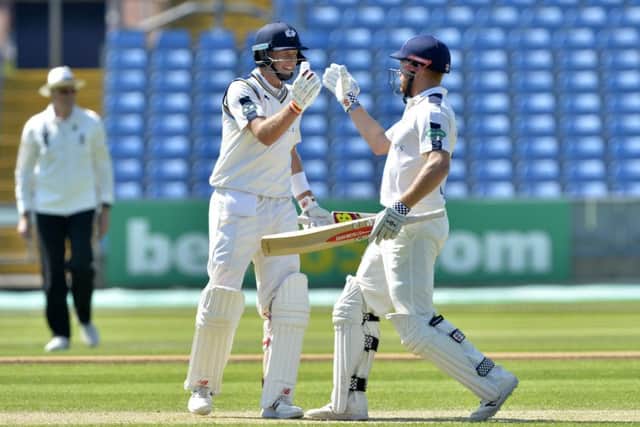 DYNAMIC DUO: Jonny Bairstow with Joe Root in action forYorkshire against Surrey earlier this week.  Picture: Bruce Rollinson