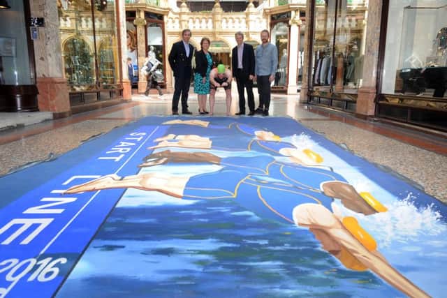 Antonio Arimany, Coun Judith Blake, Mark Fagan, Jack Buckner and Manou Bendon at the launch of a piece of 3D triathlon-inspired street art. Picture by Simon Hulme.
