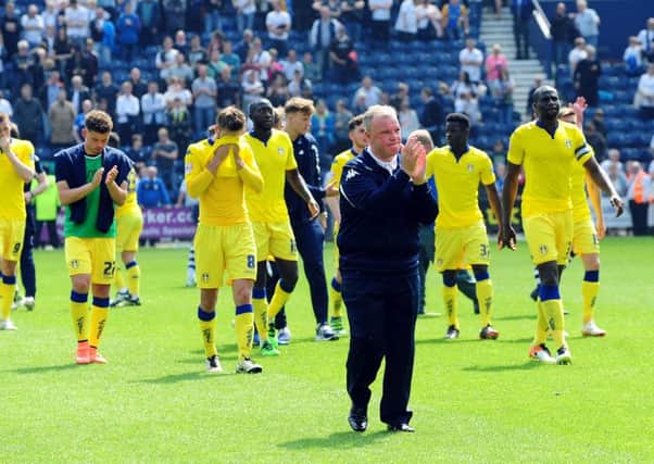 Leeds United's head coach Steve Evans and his players thank the fans.
 PIC: Jonathan Gawthorpe