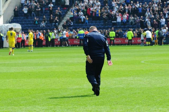 An emotional Steve Evans leaves the pitch at the end of the 1-1 draw at Preston. 
Picture : Jonathan Gawthorpe.