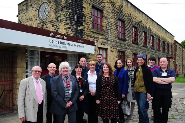 The teams from Armley Mills and Thwaite Mills museums.