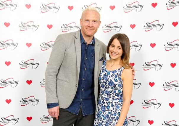 Anna Crooks along with Olympic runner Iwan Thomas.