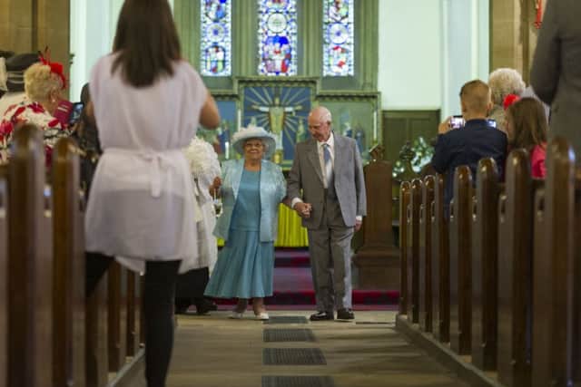 Sally, 82,  and Colin, 85, Dunn, marry at St Mary's Church Middleton, Leeds, after  44 years together. Pictures: James Hardisty