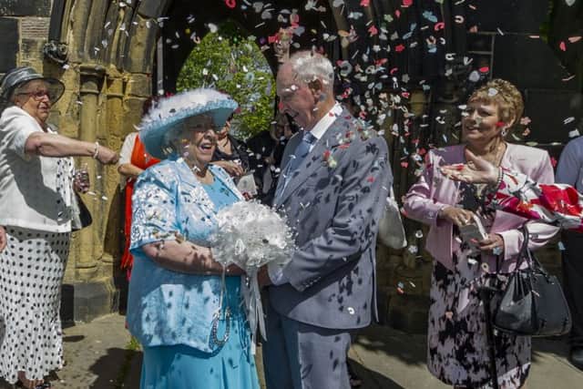Sally, 82,  and Colin, 85, Dunn, marry at St Mary's Church Middleton, Leeds, after  44 years together. Pictures: James Hardisty
