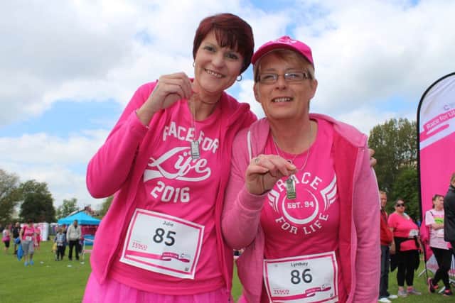 Cancer survivor Julie Hawkins and her friend Lyndsey Garrett at the Wakefield Race for Life