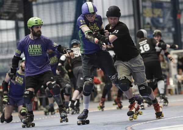 Leeds's mens' roller derby team, Aire Force One, held their first home game at the Futsal Arena against the Brothers Grimm on Saturday.
Picture: Jason Ruffell