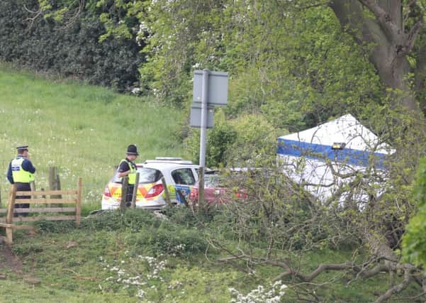 Police at the scene of the double murder in Tong, Bradford, in 2011.