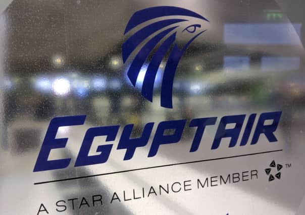 A frosted glass partition is seen at the EgyptAir counter at Charles de Gaulle Airport outside Paris, France.