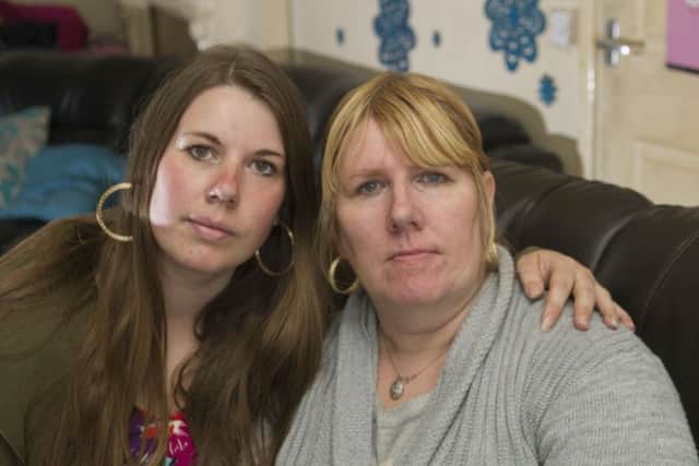 Robert Ward, of Seacroft, Leeds, died in hospital a few days after being held in custody at West Yorkshire Police's Elland Road HQ. Pictured Robert's sister Katharine Ward, 27, with their mum Liz Ward. Pic: James Hardisty