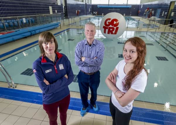 Jenny Vincent, of British Triathlon, Coun Roger Harington and triathlete Lucy Hall launch the Go Tri series in Armley. Picture by James Hardisty.