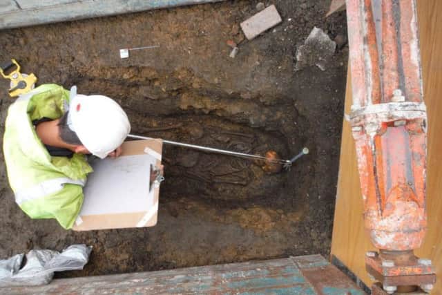 Archaeologists at work on the site.