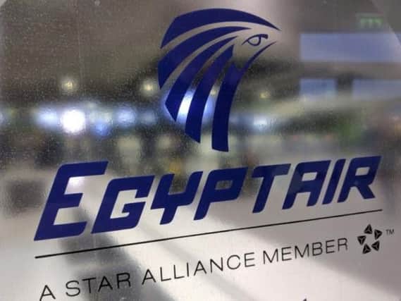 A frosted glass partition is seen at the EgyptAir counter at Charles de Gaulle Airport outside Paris, France.