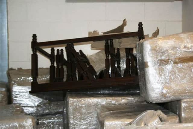 The drug smugglers hid heroin in tables.