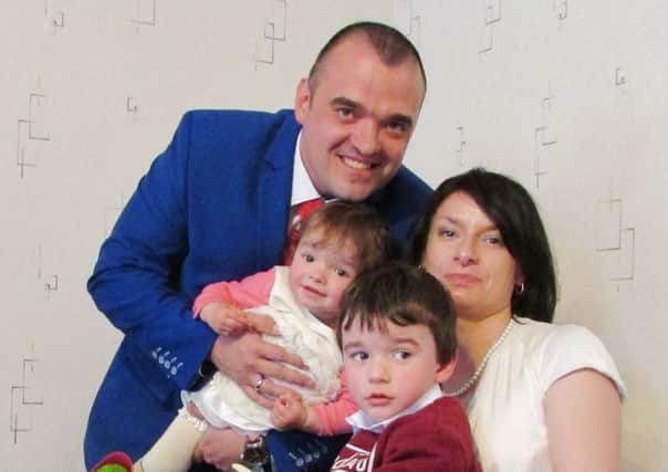 Mariola and Krzysztof Michalowski on their wedding day with their children Oliver and Veronica.