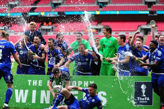 FC Halifax Town celebrate their FA Trophy final victory over Grimsby Town PIC: Jonathan Gawthorpe