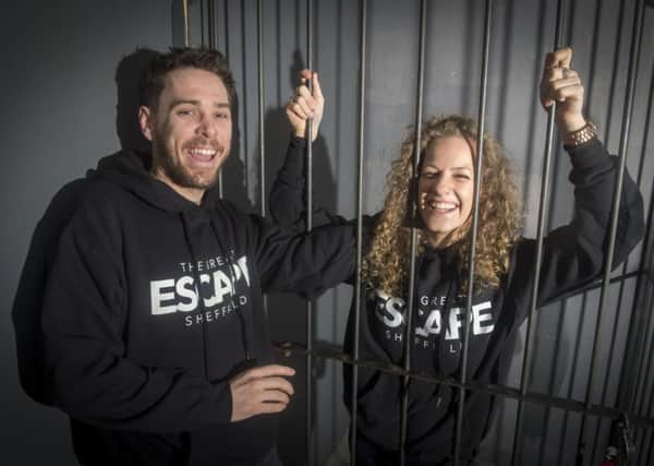 Hannah Duraid and Peter Lecole set up The Great Escape game in Sheffield.