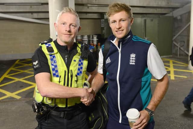 Sgt Paul Dennison with England batsman Joe Root