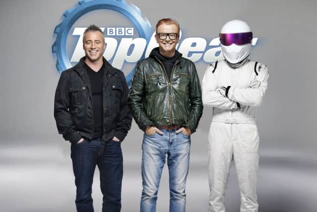Matt LeBlanc, Chris Evans and The Stig take the wheel of the new-look Top Gear. PIC: PA Photo/BBC