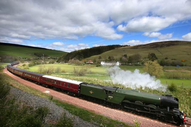Flying Scotsman makes its way along the new Borders rail route near Heriot in the Scottish Borders. PIC: PA