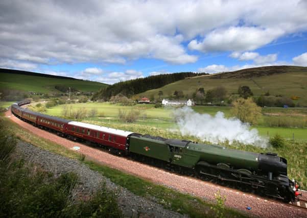 Flying Scotsman makes its way along the new Borders rail route near Heriot in the Scottish Borders. PIC: PA