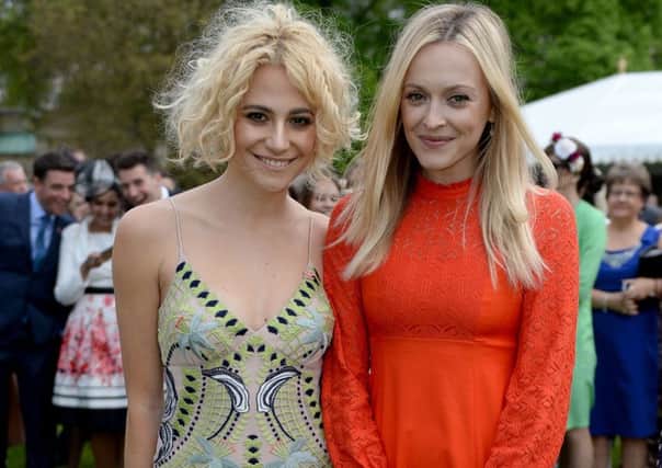 Pixie Lott (left) and Fearne Cotton during a garden party to mark The Prince's trust's 40th anniversary at Buckingham Palace in London. Anthony Devlin/PA Wire