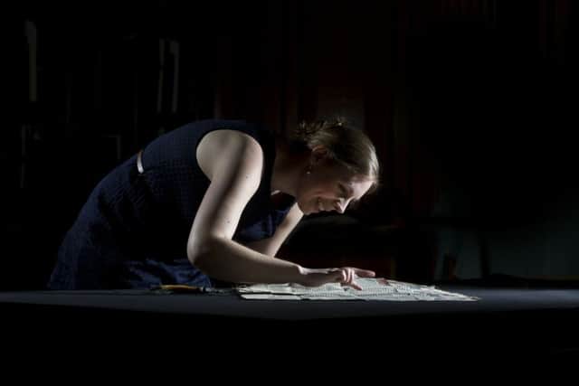 Pictured Rebecca Bowd, data migration assistant at Leeds University Special Collections, looking at the Letters Patent of Queen Elizabeth I, 1574, granting lands in Yorkshire to George Lamplugh in return for his service during the rebellion in the North.
