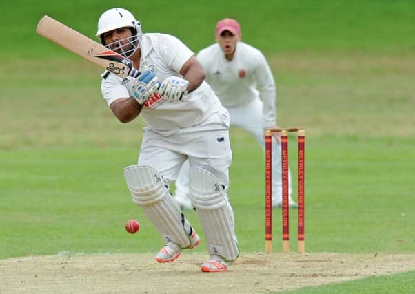 Arsham Malik, of Gomersa,l goes on the attack before rain stopped play at Methley.