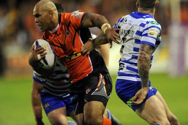 Castleford's Jake Webster bursts through to score his try.