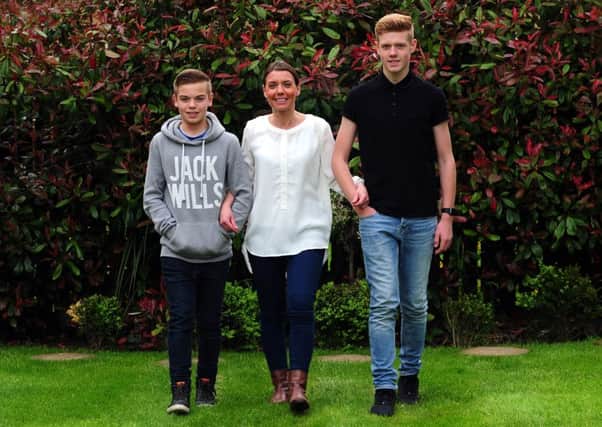 Kate Dawson with her sons Sam and Josh.