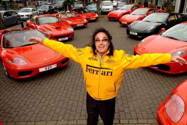 25th May 2005.  Chris Meek amongst the Ferrari's outside the Flying Pizza on Street Lane.