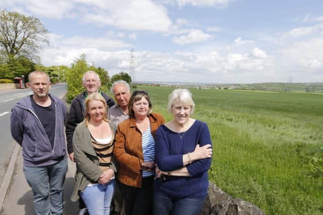 Coun Robert Finnigan, Coun Lew Beever, Alan Paul, Claire Paul, Janice Beever and Coun Wyn Kidger are campaigning against the plans. Picture by John Clifton.
