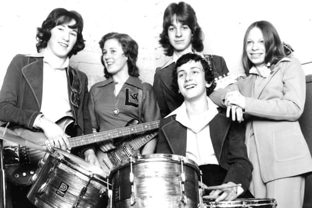 Leeds, 12th March 1976

The Charisma pop group, which is among the winners in this year's TopTalent competition - the annual search for ability in music, song and dance organised by Leeds Girls' Choir with the help of the Evening Post.

Many of the winners will take part in a concert at Leeds Town Hall on March 31.

Left to right; Andrew Marshall, Hebden Walk, Seacroft, Carole Mooney, Briarsdale Court, Gipton, John Bootle, Kentmere Avenue, Seacroft, Kevin Chippindale, Ringwood Avenue, Seacroft, and Pauline Buchanan, Poole Crescent, Cross Gates.