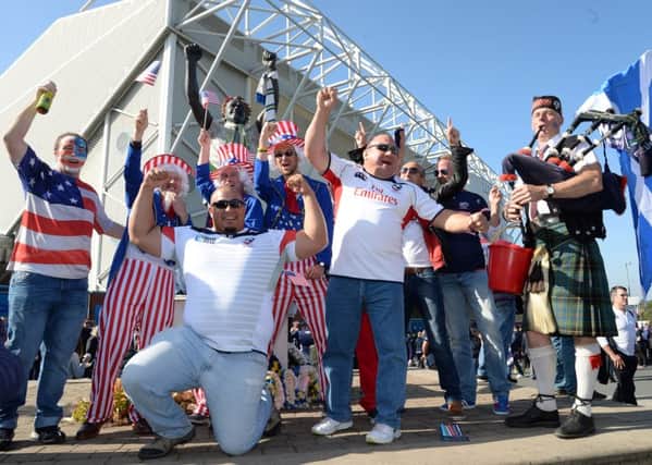 USA fans next to the Billy Bremner statue outside Elland Road for the Scotland v USA World Cup rugby match. Picture: Anna Gowthorpe