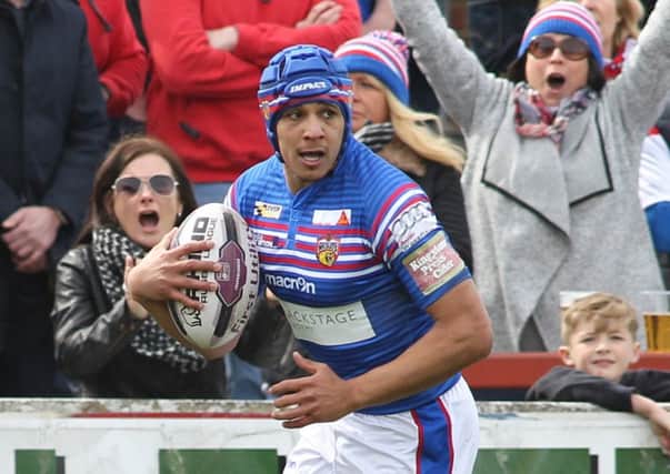 Small comfort: Ben Jones-Bishop scored a try for Wakefield but it was far from enough as they slipped to a heavy defeat at Salford.