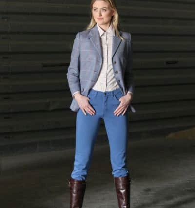 Amy wears: Burford Storm Tab jacket, Â£295; stretch cotton slim trousers, Â£89; long double buckle boot, Â£179; suede Hurdler bag, Â£139; and Spring Tattersall shirt, Â£65. Cordings in Harrogate.
