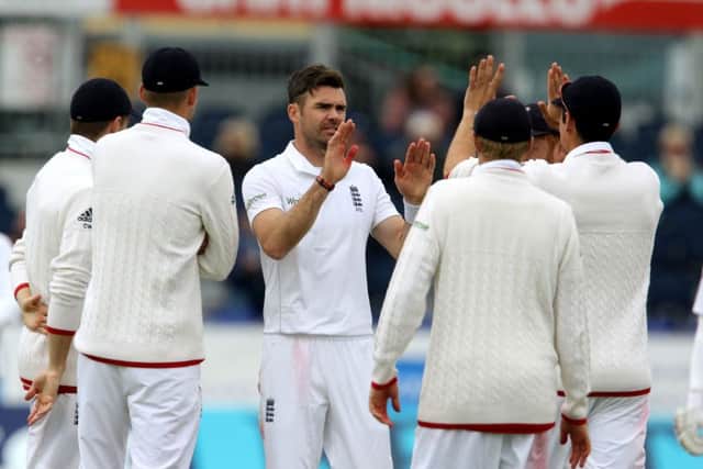 England's James Anderson and team celebrate after Sri Lanka's Rangana Herath wicket. Picture: Richard Sellers/PA.