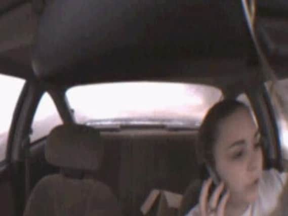 The terrifying moment a teenage driver crashes while chatting on her mobile
