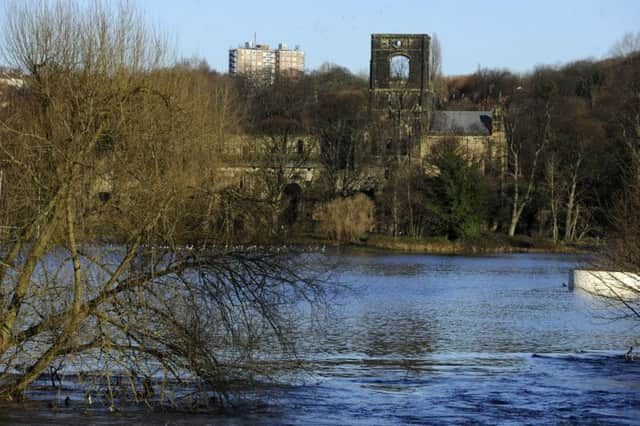 Flooded River Aire and Kirkstall Abbey at Bridge Road.