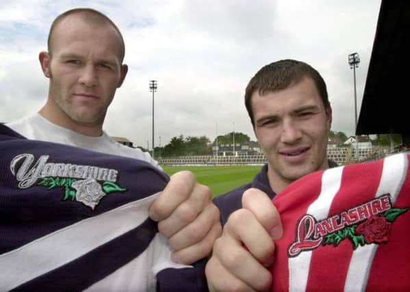Leeds Rhinos stars Keith Senior and Iestyn Harris with their respective shirts in preparation for the Yorkshire v Lancashire clash in 2001.