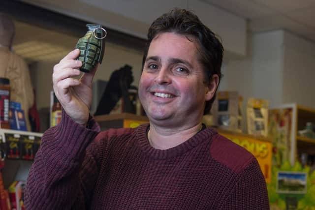 Frank Jay, owner of the Chilli-Shop, holds a vile of Death Cap, a 13 million scoville rated chilli extract enclosed within mock grenade packaging, in the Merrion Centre, Leeds, West Yorkshire. See Ross Parry Copy RPYCHILLI:  Housed in a grenade, never a good sign, the little vial of Death Cap engineered chilli extract hits 13,000,000 units on the Scoville scale - making it the hottest substance on sale in the UK. That means, for all those uninitiated, that for every single drop of this hellish stuff it would take 13m drops of water to neutralise the heat. If that doesn't drive home the brutish nature of this unbelievably hot substance then maybe the fact it is six times stronger than the standard UK police pepper spray might. And, according to the man peddling this steamy stuff, it is twice the heat of chemical weapons.