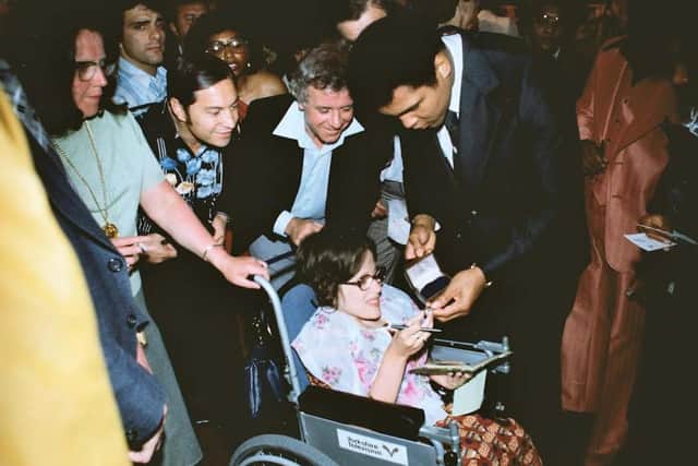 Julie Collins meets Muhammad Ali in 1977.