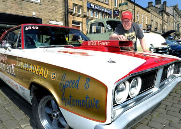 Andrew Bosomworth gets his 1966 Dodge Coronet ready. PIC: Jonathan Gawthorpe
