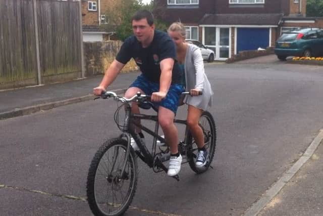 Jack Makepeace and Charlotte Webber on their tandem, which was stolen from their home in Fountain Street, Morley.