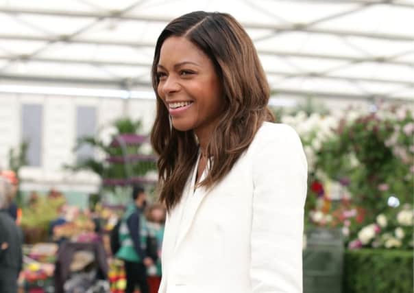 Miss Moneypenny Naomi Harris steps out at the Chelsea Flower Show keeping it short and dazzling bright white in this chic tailored trouser suit, teamed with an orange tan cross shoulder bag. Maybe she's just proving she can look just as good in sharp white linen as any of the male Bond contenders. Whatever, it's a perfect Chelsea look.


Stephanie Smith
Yui Mok/PA Wire



 at the Royal Hospital Chelsea in London. PRESS ASSOCIATION Photo. Picture date: Monday May 23, 2016. See PA story CONSUMER Chelsea. Photo credit should read: Yui Mok/PA Wire