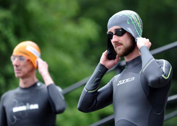 Reporter Jonny Brown at a Go Tri open water swimming session at Roundhay Park. Picture by Jonathan Gawthorpe.