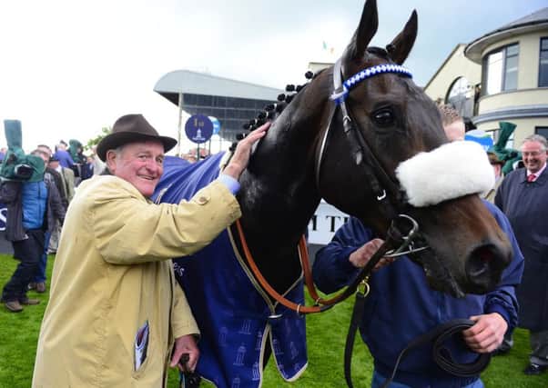 Trainer Kevin Prendergast with Awtaad after his winning ride in The Tattersalls Irish 2000 Guineas.