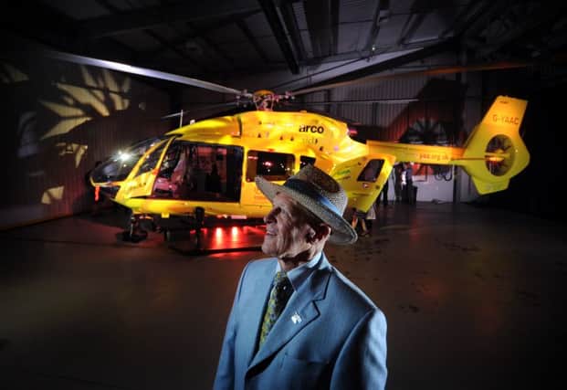 Yorkshire Air Ambulance patron Geoffrey Boycott unveils the new helicopter. Picture by Simon Hulme