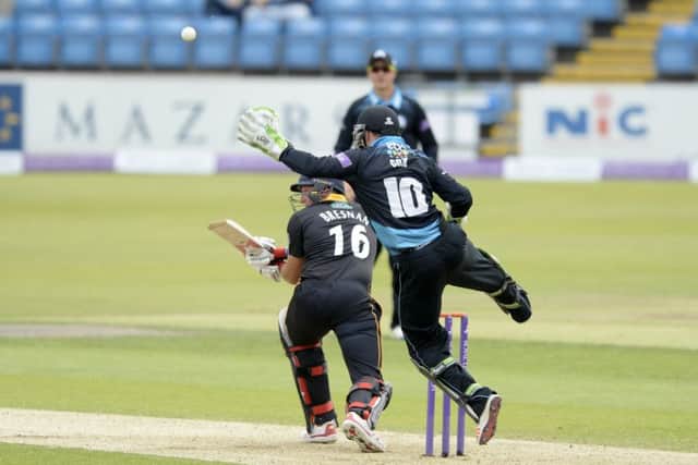 Ben Cox tries to take a catch to dismiss Yorkshire's Tim Bresnan.